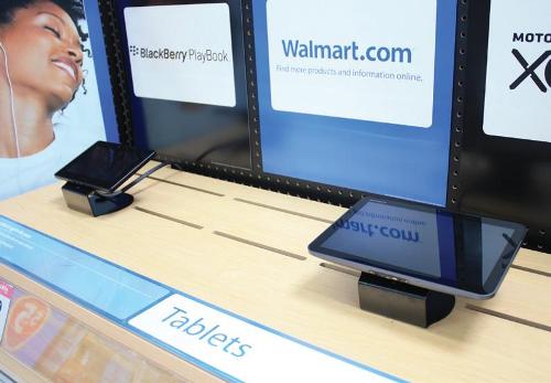 Использование противокражных систем инвью inVue ля защиты от краж планшетников планшетных компьютеров в торговом зале Walmart, USA